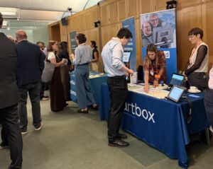 People visiting exhibition stands