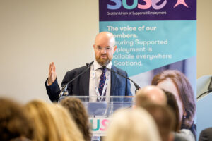 David Cameron presenting at the SUSE Conference.